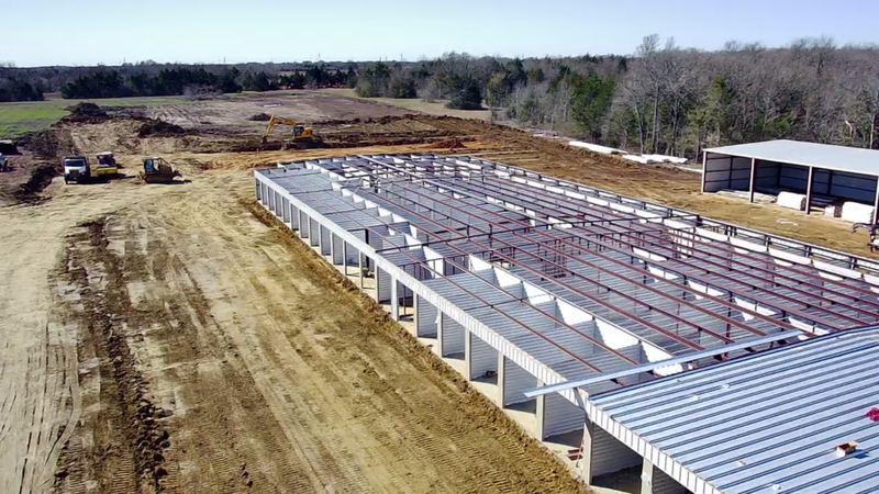Storage-unit buildings going up on a graded commercial site